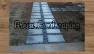 A walkway with stepping stones in the middle of it.